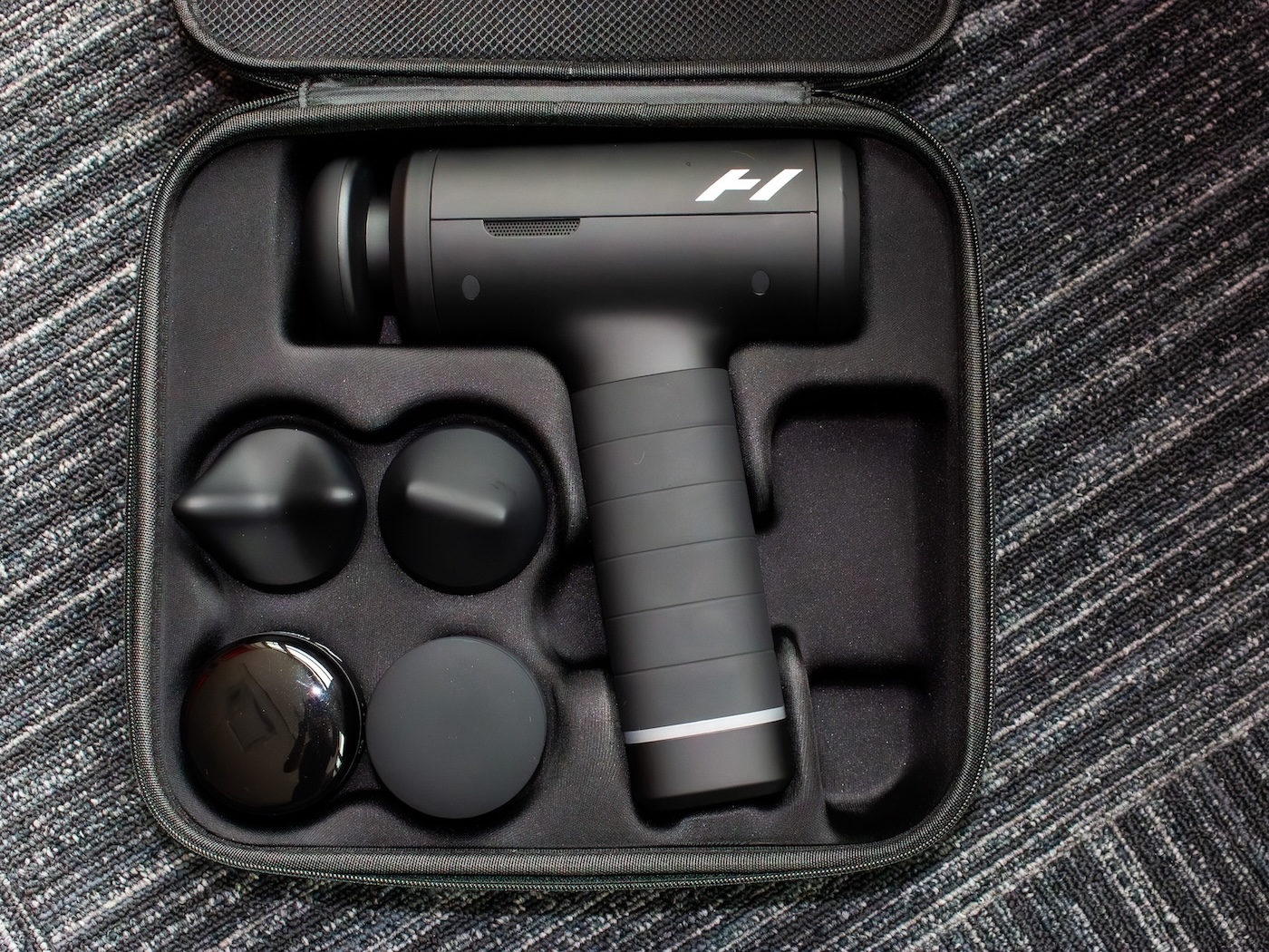 Massage Gun inside of its case at Pace317