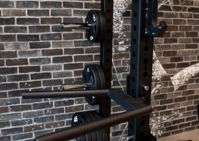 weight lifting rack with various sized weights at Pace317